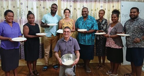 Pictured with samples of fortified rice are, standing from left, Patricia Soqoilo, Dian Row, Jahreth Limarii, Fiona Mulhearn, Nemia Bainivalu, Zema Joseph, Annie Eli, and Muffat Taro. Kneeling is Dennis Bittisnich.